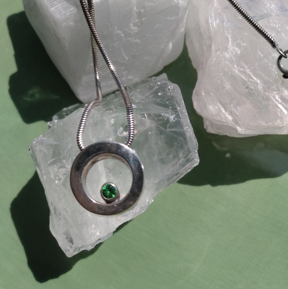 Movado Jewelry - 💝Movado circle necklace with peridot stone